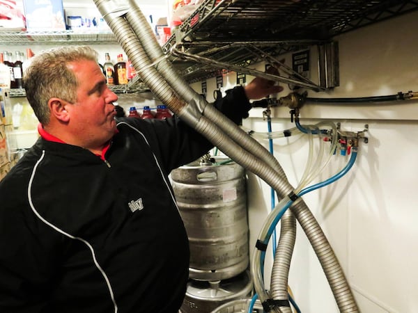 Todd Keeling works with beer equipment. He was found dead at age 48 inside a walk-in cooler in SunTrust Park on Tuesday, June 26, 2018. (Courtesy of Nathan Churchill)