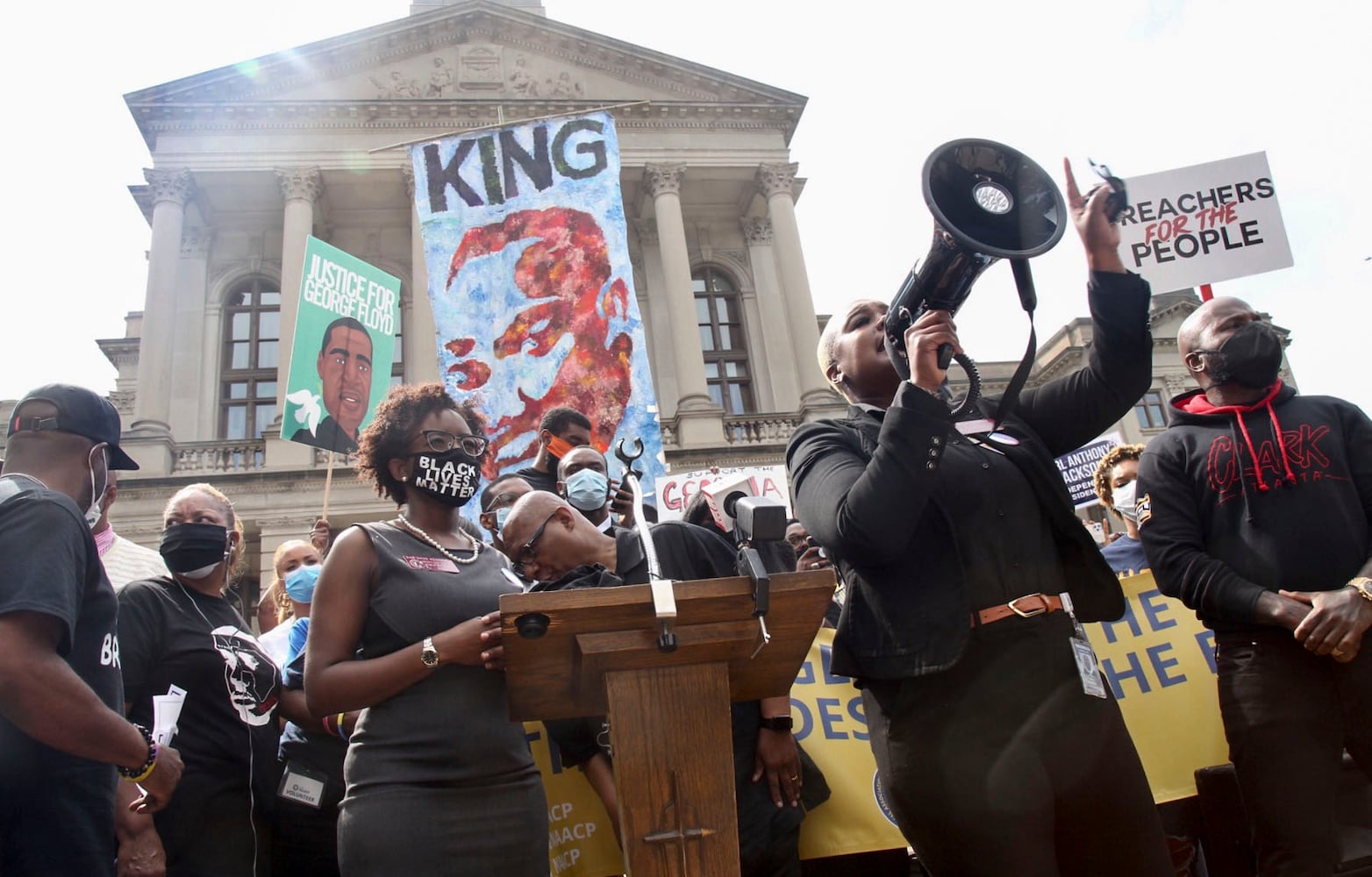 PHOTOS: Thousands march at Georgia Capitol as lawmakers return