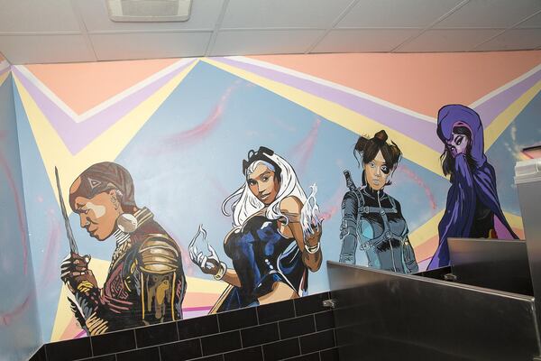 One of the murals at Slim and Husky’s Pizza Beeria. ALYSSA POINTER / ALYSSA.POINTER@AJC.COM