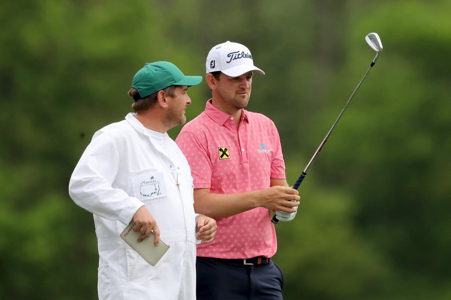 April 9, 2021, Augusta: Bernd Wiesberger confers with his caddie James Lane before he tees off on the twelfth hole during the second round of the Masters at Augusta National Golf Club on Friday, April 9, 2021, in Augusta. Curtis Compton/ccompton@ajc.com