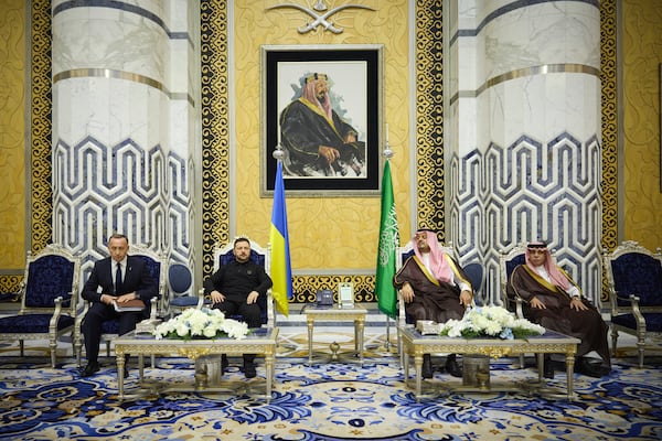 In this photo provided by the Ukrainian Presidential Press Office, Ukrainian President Volodymyr Zelenskyy, center left, meets with Prince Saud bin Mishaal, deputy governor of Saudi Arabia's Mecca region, center right, and Saudi Commerce Minister Majid bin Abdullah al-Qasabi in Riyadh, Saudi Arabia, Monday, March 10, 2025. (Ukrainian Presidential Press Office via AP)