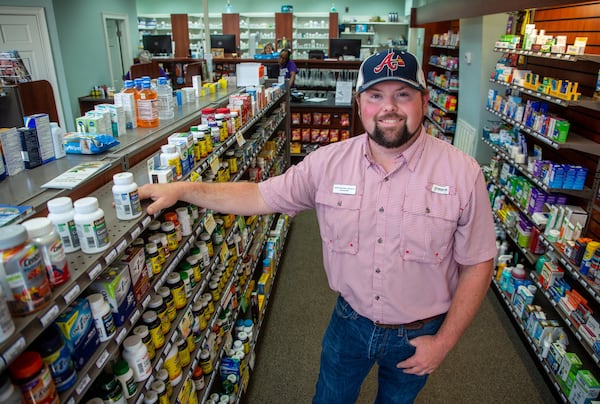 Pharmacist Josh Patterson of Roberta Drugs says that most of the locals who want to be vaccinated are vaccinated. And, unless their circumstances change or the pandemic gets even worse, he can’t imagine demand growing much. (Steve Schaefer for The Alanta Journal-Constitution)