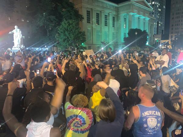 In a photo provided by Jada W., protesters gather in downtown Louisville. The demonstrations continued early Friday.