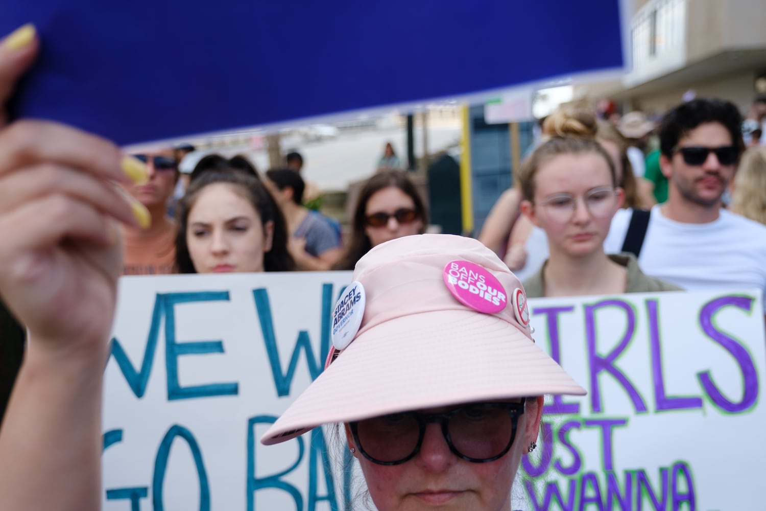 Abortion rights activists rally at Centennial Olympic Park in Atlanta on Friday, June 24, 2022. The protest follows the Supreme Court’s overturning of Roe v Wade. (Arvin Temkar / arvin.temkar@ajc.com)