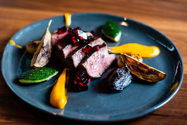 Coulotte steak at the Alden, served with summer squash, carrot puree, black onion jam and red wine jelly. CONTRIBUTED BY HENRI HOLLIS