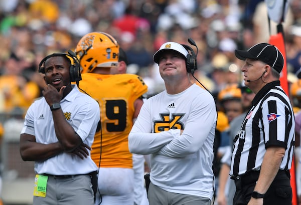 September 11, 2021 Atlanta - Kennesaw State's head coach Brian Bohannon reacts as he watches a replay during the first half of an NCAA college football game at Georgia Tech's Bobby Dodd Stadium in Atlanta on Saturday, September 11, 2021. Georgia Tech won 45-17 over Kennesaw State. (Hyosub Shin / Hyosub.Shin@ajc.com)