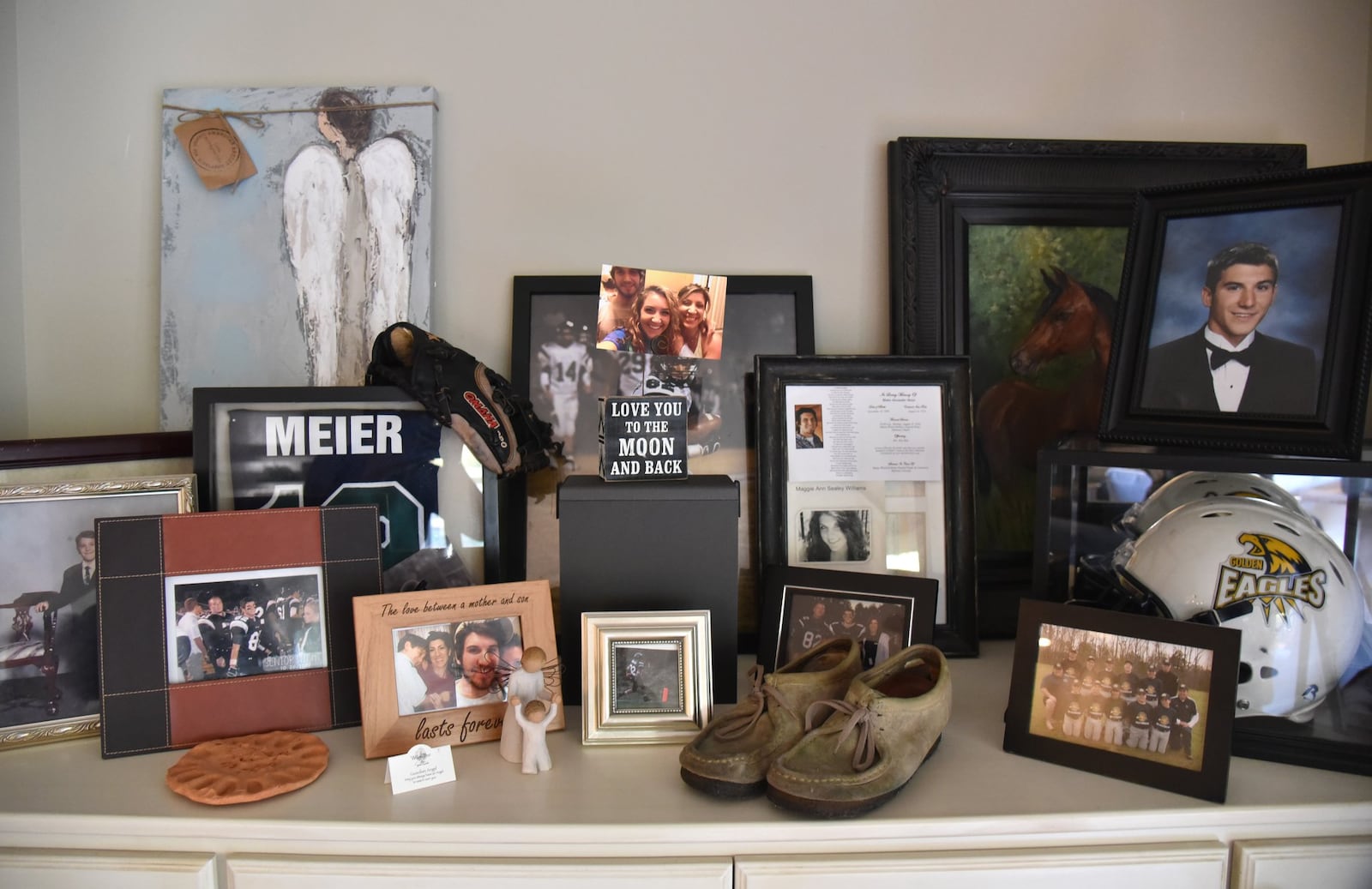 In a small memorial at her home, Dawn Camarda keeps personal items of her son Blake Meier, who died of a opioid overdose in 2016. HYOSUB SHIN / HSHIN@AJC.COM