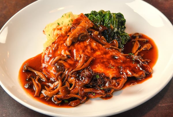 Petto di pollo al Marsala (Chicken Marsala) at Toscano. (Chris Hunt for The Atlanta Journal-Constitution)