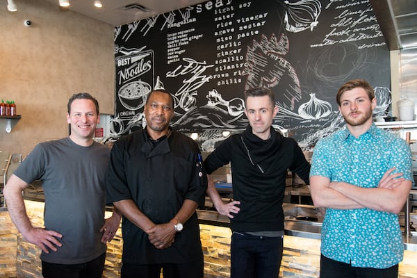  One Rooster Mongolian Bar team (from left to right) co-owner Mike Blum, chef Alvin Reed, co-owner Nicholas Brown, and beverage director Caleb Brown. Photo credit - Mia Yakel.