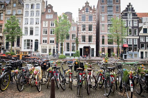  Floral vandals take to the streets of Amsterdam to mark the opening of botanically inspired Kimpton De Witt hotel on June 8, 2017 in Amsterdam, Netherlands.  (Photo by Tristan Fewings/Getty Images for Kimpton De Witt hotel)