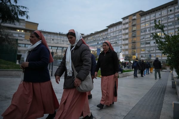 Nuns leave after they prayed for Pope Francis in front of the Agostino Gemelli Polyclinic, in Rome, Saturday, March 8, 2025, where the Pontiff is hospitalized since Friday, Feb. 14. (AP Photo/Andrew Medichini)