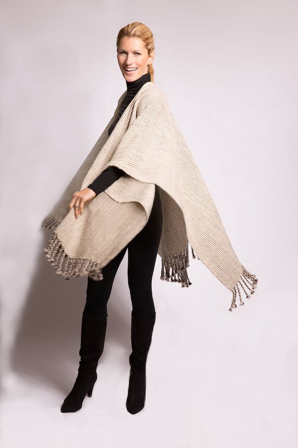 Virginia’s Gum Tree Farm raises sheep organically and then processes the wool into hand-woven, knitted or sewn pieces, such as this cape with hand-knitted fringe. Contributed by gumtreefarmdesigns.com