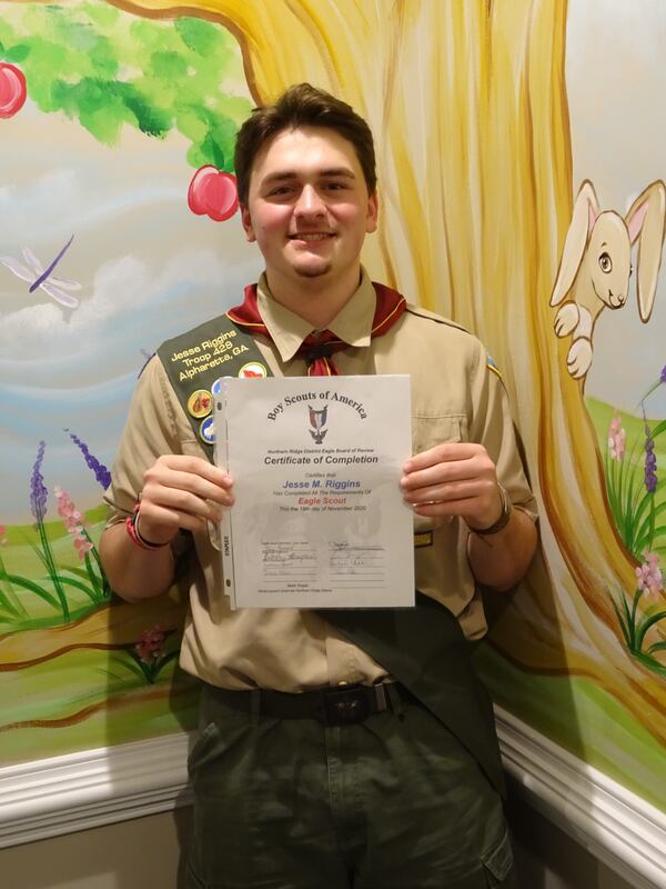 Jesse Riggins, of Troop 429, sponsored by Alpharetta Presbyterian Church,
whose project was the cleaning out of a storage trailer and designing and constructing 2 shelving
units 4’x 22’for St. Aidan’s Episcopal Church