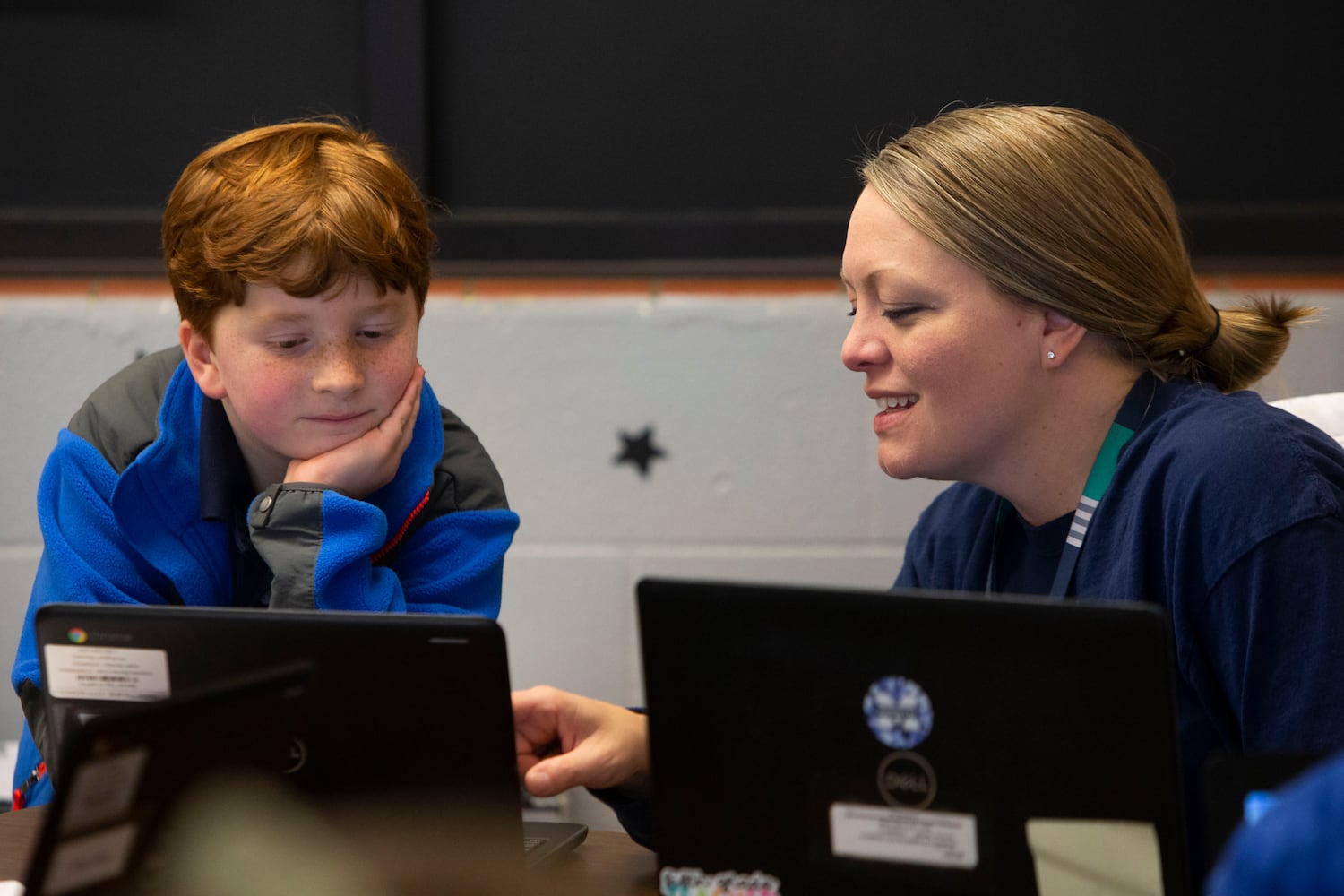 Trisha Tanner, fifth-grade teacher, helps students Nolan Waters with a quiz during class on Wednesday, November 16, 2022, at Hickory Hills Elementary School in Marietta, Georgia. Marietta City Schools, like schools across the country, are working to overcome learning loss caused by the pandemic. CHRISTINA MATACOTTA FOR THE ATLANTA JOURNAL-CONSTITUTION