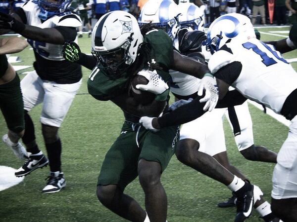 Eastside's Jayden Barr ran for 65 yards and had four tackles in the opening win over Newton. (Photo by Jeremiah Ferdilus)