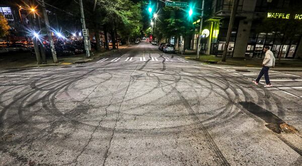 Patches of tire marks swirled across the intersection of Wesley Dobbs and Piedmont avenues near Georgia State University.

