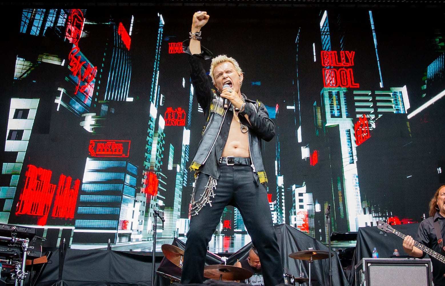 Atlanta, Ga: After a torrential downpour, Billy Idol came through and wowed the crowd with hits. The 68 year old didn't miss a beat despite wireless complications at the beginning of his set. Photo taken Sunday May 5, 2024 at Central Park, Old 4th Ward. (RYAN FLEISHER FOR THE ATLANTA JOURNAL-CONSTITUTION)