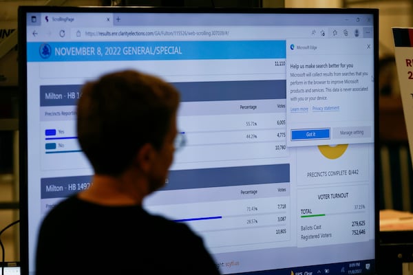 Cathy Woolard, then-chair of the Fulton County Board of Registration & Elections, watches election results come in at the Fulton County Elections Warehouse in November 2022. (Natrice Miller/natrice.miller@ajc.com)