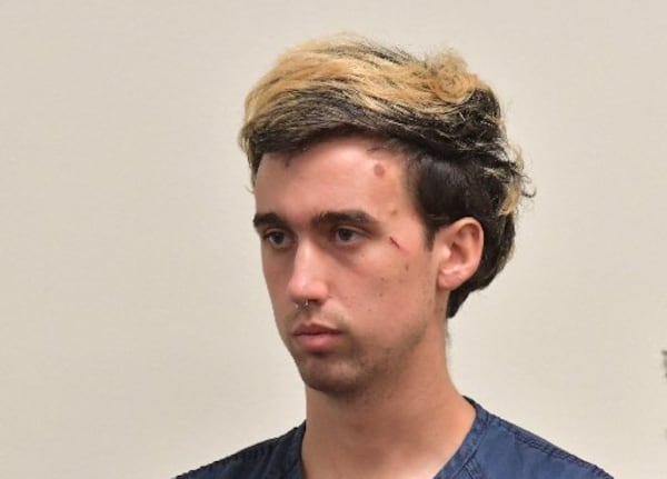 Jacob Wilson stands during a bond hearing at Fulton County jail on Wednesday, September 20, 2017.  (HYOSUB SHIN / HSHIN@AJC.COM)