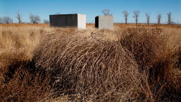 Tumbleweeds are seen near some of Donald Judd's 15 untitled works in concrete, 1980-1984, at the Chinati Foundation in Marfa, Texas. (Guy Reynolds/Dallas Morning News/TNS)