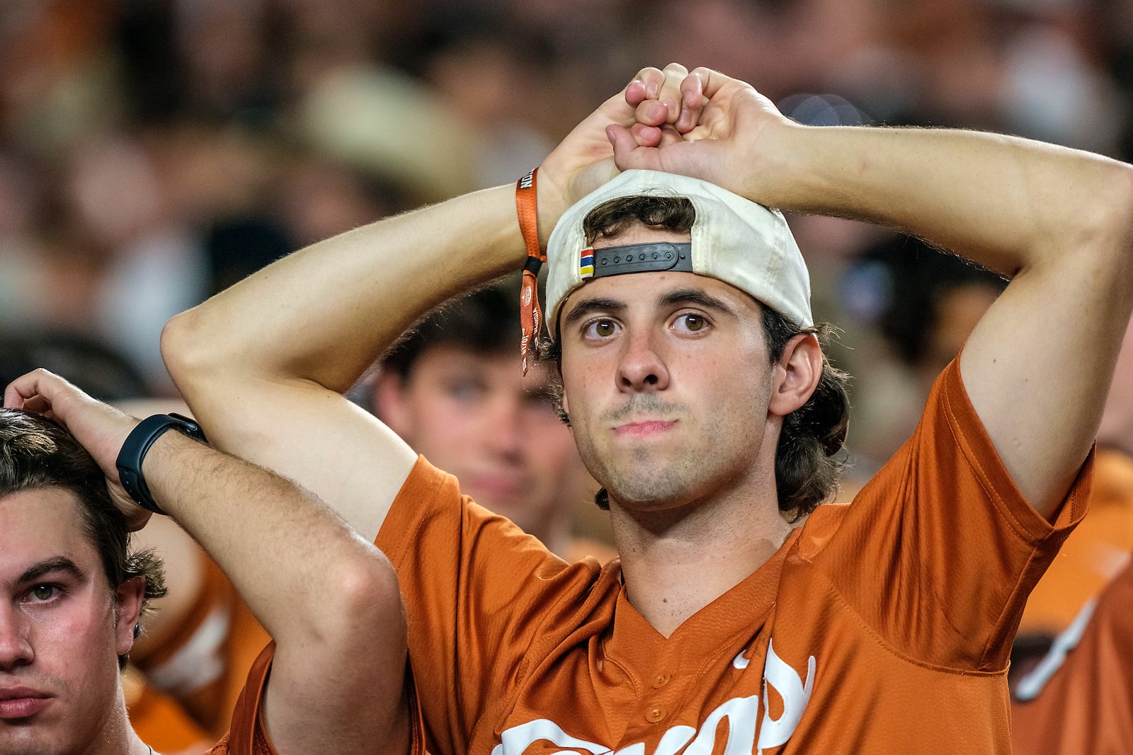 Texas fans watch the clock run out during the second half of an NCAA college football game against Georgia in Austin, Texas, Saturday, Oct. 19, 2024. (AP Photo/Rodolfo Gonzalez)