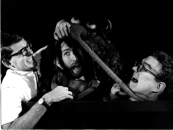 Frank Oz (left), Jim Henson (middle), and Jerry Juhl (right) pose with a puppet manned by Victor "Big V" Yerrid in a 1964 photo.