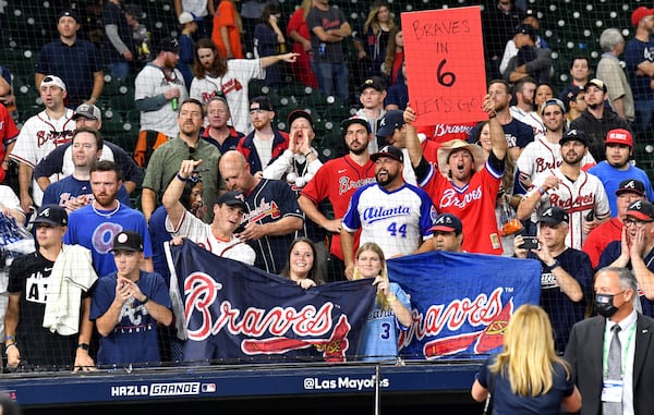 Atlanta Braves fans celebrate the Braves 7-0 win over the Houston Astros to win Game 6 of the World Series at Minute Maid Park in Houston, Texas, on Tuesday, November 2, 2021. (Hyosub Shin / Hyosub.Shin@ajc.com)