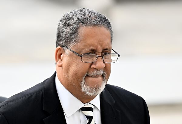 July 13 , 2022 Atlanta - Ex-Stonecrest mayor Jason Lary (right) arrives at the Richard B. Russell Federal Building for his sentencing hearing in federal fraud case related to misusing city’s COVID relief funds on Wednesday, July 13, 2022. (Hyosub Shin / Hyosub.Shin@ajc.com)