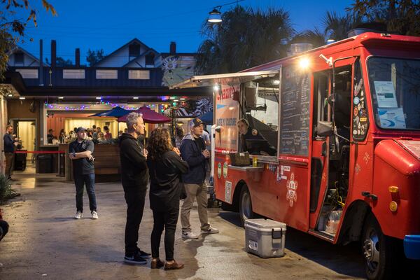 The Starland Yard is an open-air space with food trucks surrounded by shipping container buildings in the heart of Savannah's Starland District. Stephen B. Morton for The Atlanta Journal-Constitution