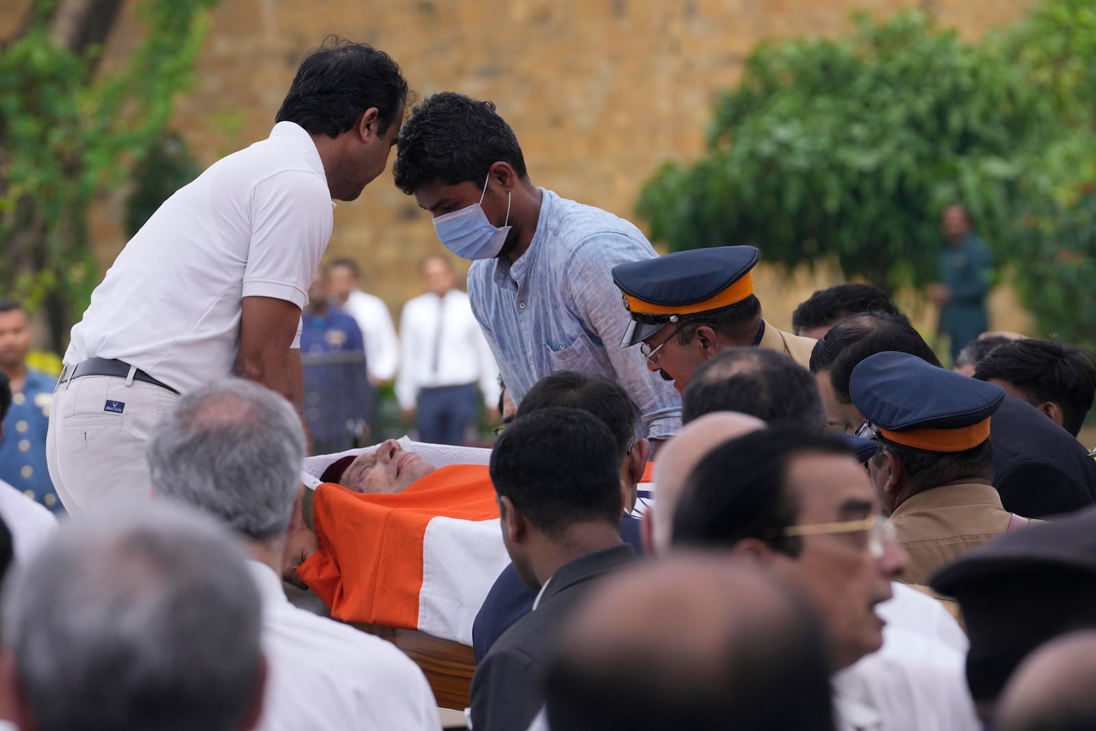 The body of Indian business leader Ratan Tata who died on Wednesday night is taken to the NCPA Lawns for the public to pay homage in Mumbai, India, Thursday, Oct. 10, 2024. (AP Photo/Rajanish Kakade)