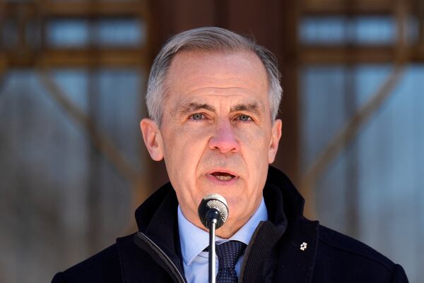 Canada Prime Minister Mark Carney speaks to media at Rideau Hall, where he asked the Governor General to dissolve Parliament and call an election, in Ottawa, Sunday, March 23, 2025. (Adrian Wyld/The Canadian Press via AP)