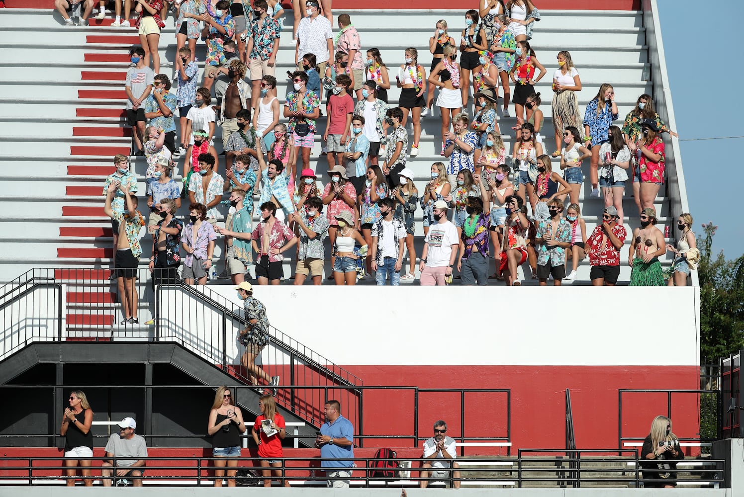 Cherokee high school students react after a field goal in the first half of the Cherokee game against Carver-Atlanta at Cherokee at Cherokee high school Wednesday, September 2, 2020 in Canton, Ga.. JASON GETZ FOR THE ATLANTA JOURNAL-CONSTITUTION