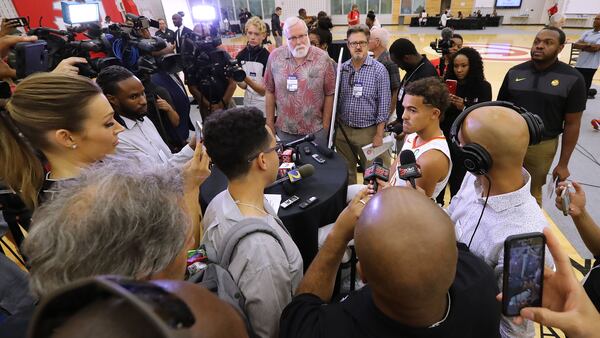 Atlanta Hawks guard Trae Young is surrounded by media throng during his interview time on media day Monday, Sept. 30, 2019, Emory Sports Medicine Complex in Atlanta.