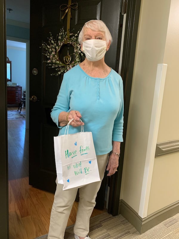 Sylvia Warden, a resident at Mount Vernon Towers Condominiums is seen with a gift bag courtesy of a chapter of the National Charity League. CONTRIBUTED: MOUNT VERNON TOWERS