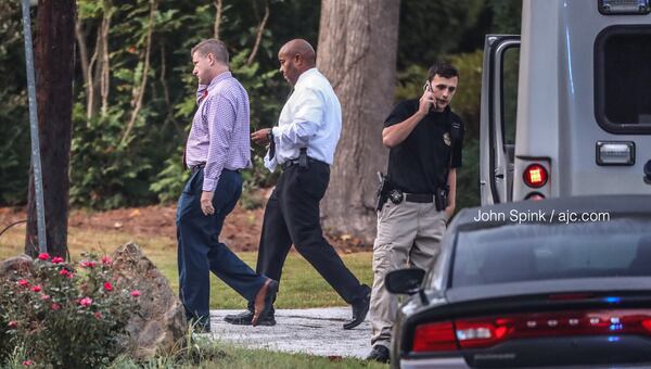 Rockdale County detectives gathered evidence at the scene of a deadly shooting on White Oak Court. 