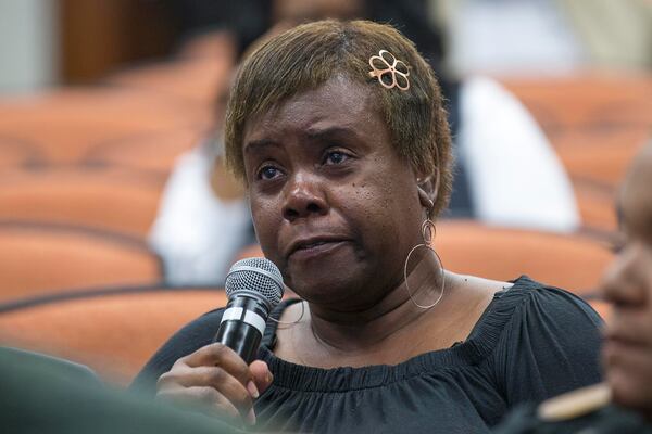 04/12/2019  -- Atlanta, Georgia -- Violet Clark becomes emotional as she talks about the Grady Chronic Care Clinic during a graduation celebration at Grady Memorial Hospital in Atlanta, Friday, April 12, 2019. The Chronic Care Clinic hosted a celebration graduation for people who had fallen out of the health system, except for going to the ER for emergencies. These patients are signed up for the Chronic Care Clinic and "surrounded" with resources including a community health worker who works with them to educate them on using resources properly, such as taking medications regularly, going to a primary care clinic for non-emergencies, and keeping up with problems before they become emergencies. (ALYSSA POINTER/ALYSSA.POINTER@AJC.COM)