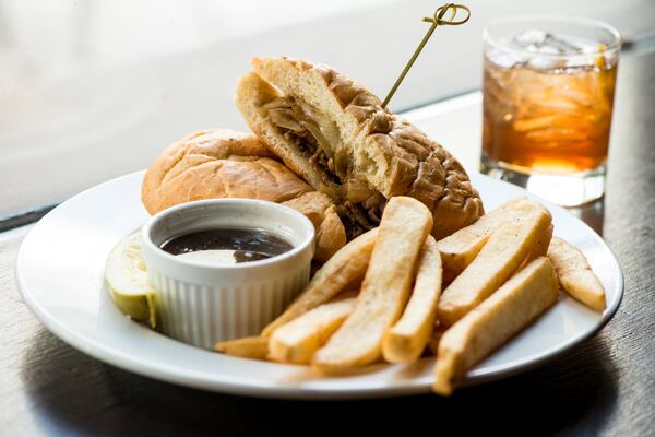 The French Dip sandwich with au jus and steak fries. Credit: Mia Yakel.