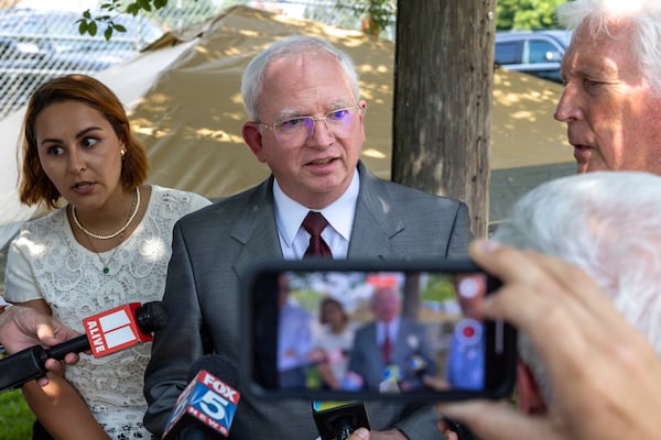 John Eastman, an attorney indicted with former President Donald Trump, makes a statement to the press outside the Fulton County Jail in Atlanta, where he was booked in August. (Arvin Temkar / arvin.temkar@ajc.com)