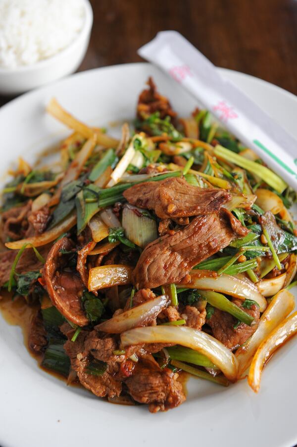 Lamb with Leeks, cilantro in hot bean sauce. (BECKY STEIN PHOTOGRAPHY)