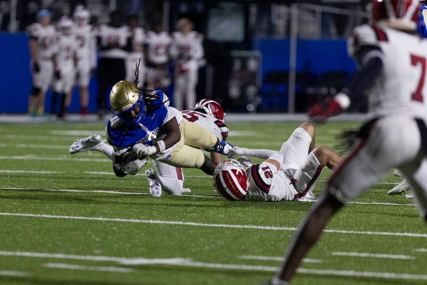 McEachern’s Jayreon Campbell (10) is tackled during a NCAA High School football game between Hillgrove and McEachern at McEachern High School in Powder Springs, GA., on Friday, October 18, 2024. (Photo/Jenn Finch, AJC)