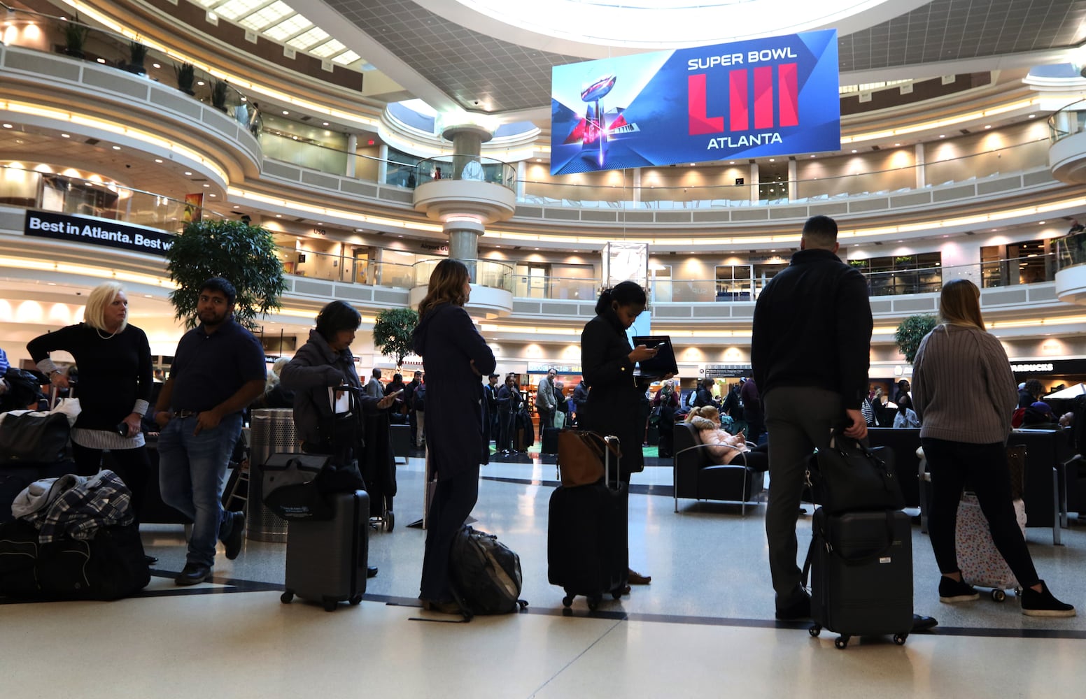 PHOTOS: Atlanta airport travelers stuck in long TSA wait lines