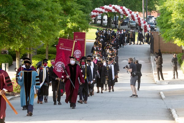 Graduates march to Century Campus at Morehouse College for the 137th commencement that celebrates the classes of 2020 and 2021 on Sunday, May 16, 2021. (Photo: Steve Schaefer for The Atlanta Journal-Constitution)