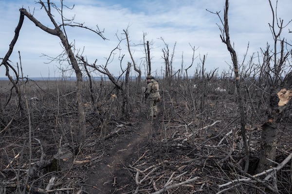 FILE - A Ukrainian soldier walks near Klishchyivka, Donetsk region, Ukraine, Monday, March 18, 2024. (Iryna Rybakova via AP, File)