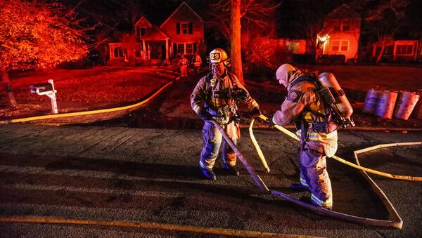 Crews extinguished a blaze that damaged the first floor of a home Friday in northeast Atlanta. JOHN SPINK / JSPINK@AJC.COM