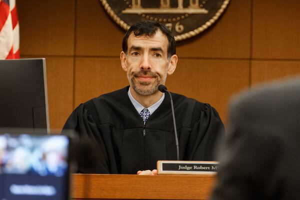 Judge Robert McBurney heard arguments listens to remarks from defense attorney Don Samuel at Fulton County Courthouse during the bond hearing for Tex McIver on Friday, October 7, 2022. (Natrice Miller/natrice.miller@ajc.com)  