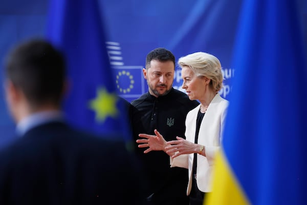 European Commission President Ursula von der Leyen, right, speaks with Ukraine's President Volodymyr Zelenskyy as they arrive for an EU Summit at the European Council building in Brussels, Thursday, March 6, 2025. (AP Photo/Omar Havana)