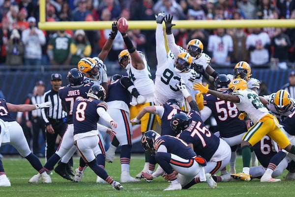 Green Bay Packers' Karl Brooks blocks a field goal attempt of Chicago Bears' Cairo Santos during the second half of an NFL football game Sunday, Nov. 17, 2024, in Chicago. The Packers won 20-19. (AP Photo/Charles Rex Arbogast)