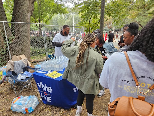 Vote to Live's voter registration table at the 2024 One Musicfest handed out waters and helped concertgoers prepare for the upcoming election.