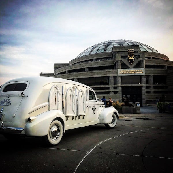 A hearse is seen outside of the Charles H. Wright Museum of African American History as fans gather to pay their respects to Aretha Franklin during a public viewing on Tuesday, August 28, 2018.