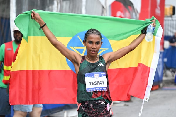 Fotyen Tesfay wins Elite Women’s division of the 54th running of the Atlanta Journal-Constitution Peachtree Road Race in Atlanta on Tuesday, July 4, 2023.   (Hyosub Shin / Hyosub.Shin@ajc.com)